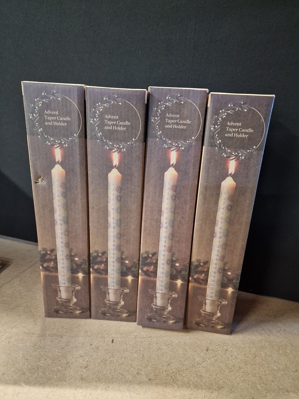 Lot 400: Four Boxed Advent Taper Candle and Holder Sets