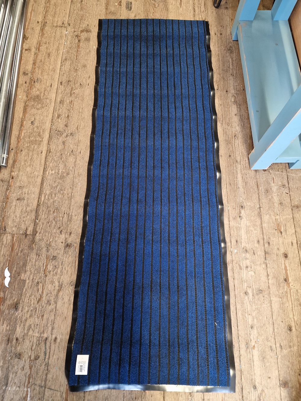Lot 313: A Blue and Black Striped Mat