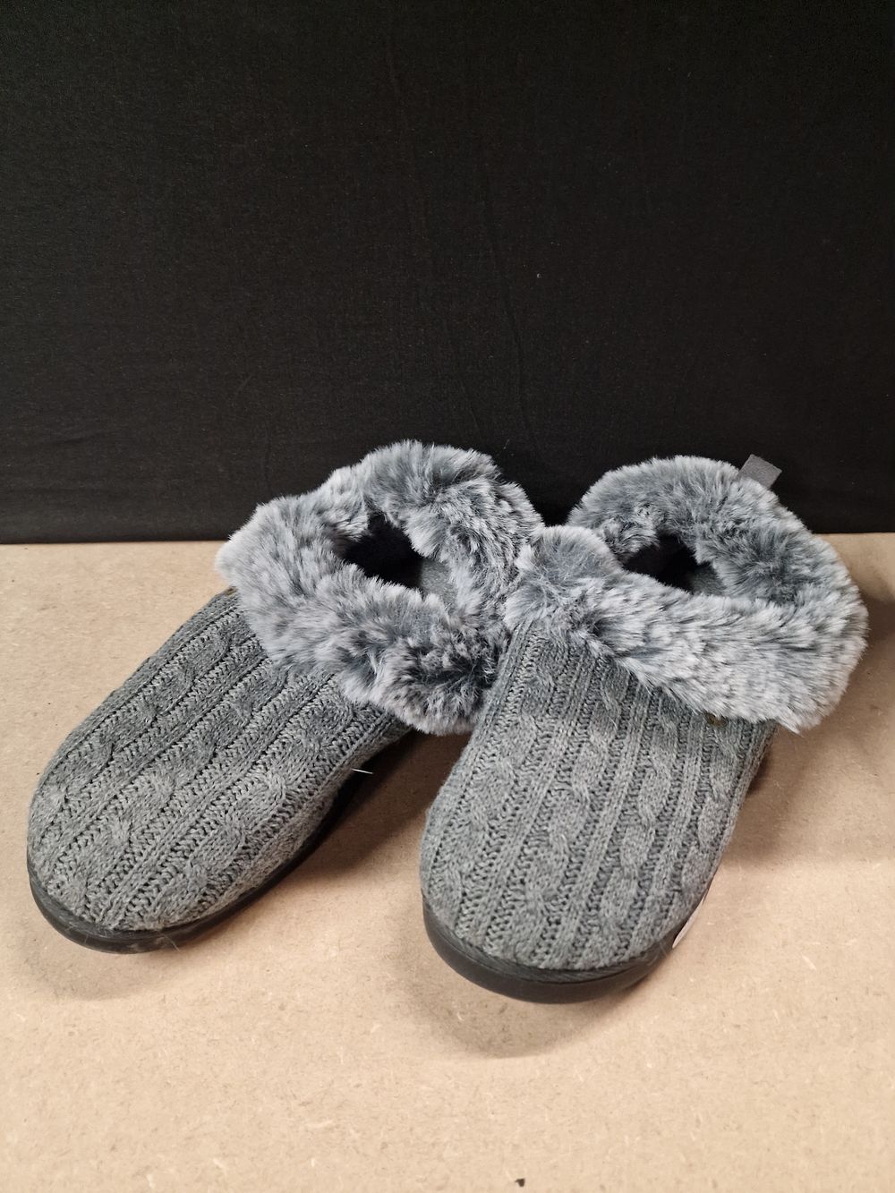 Lot 317: A Pair of Grey Slippers