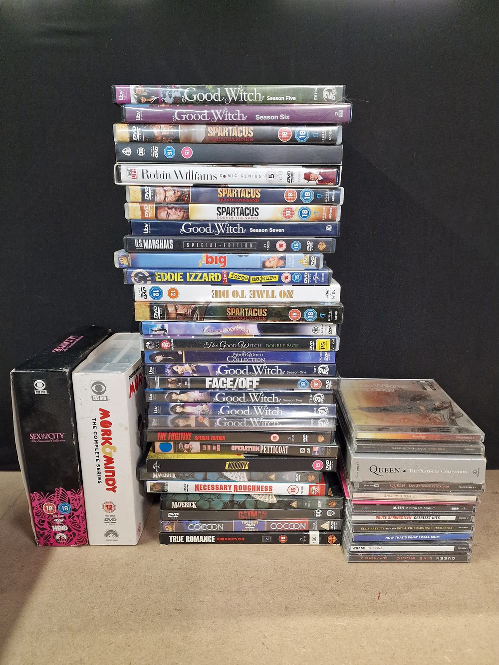 Lot 348: A Collection of 43 Assorted CDs and DVDs