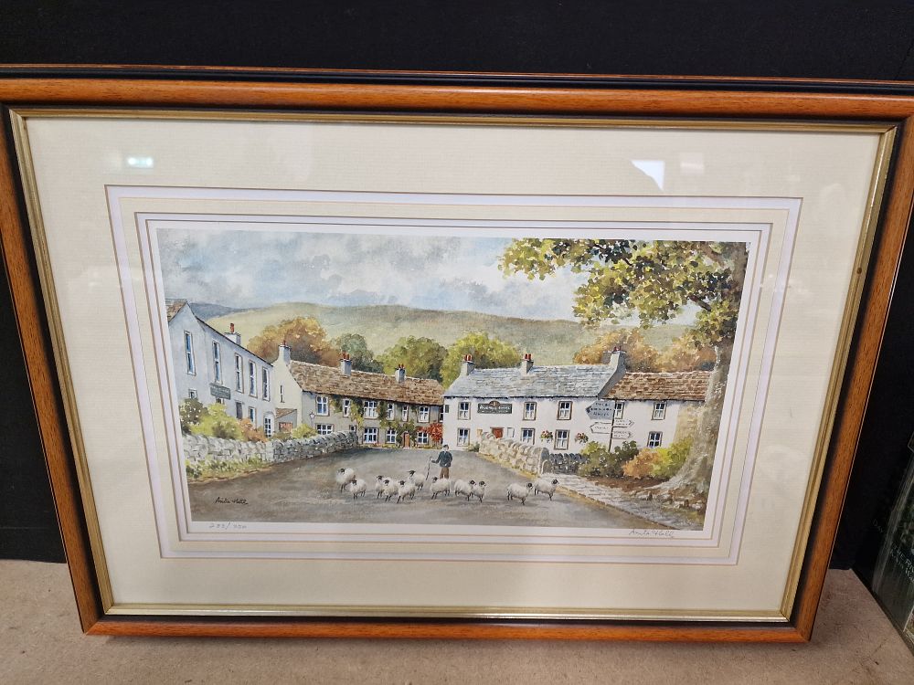 Lot 365: A Framed Watercolor Print by Anita Hall, Village Scene