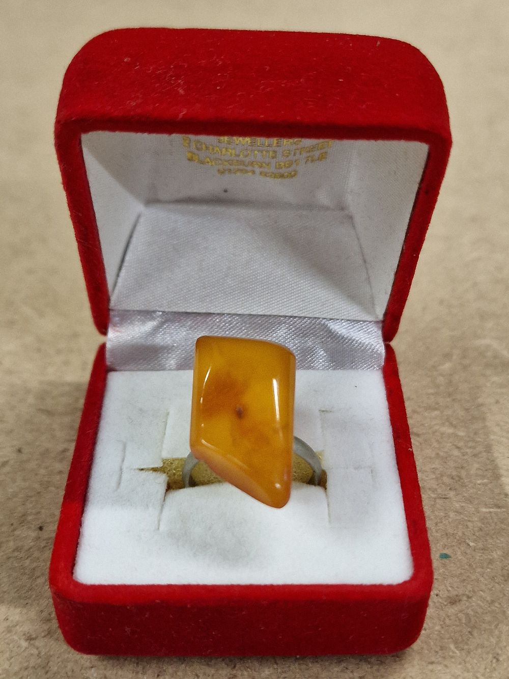 Lot 373: Modernist Silver-Colored Ring with Natural Amber Gemstone, Size L/M