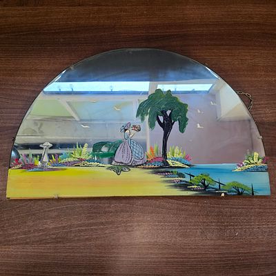 Art Deco Reverse Painted Arch-Topped Crinoline Lady Mirror. A decorative, arch-topped mirror 