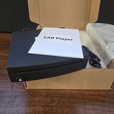 External USB CD Player Kit for Car. A black car player unit featuring an eject button and slot 
