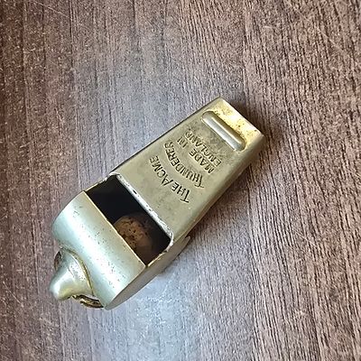 Acme Thunderer Metallic Silver-Tone Whistle Made in England. A tarnished, metallic silver-tone 