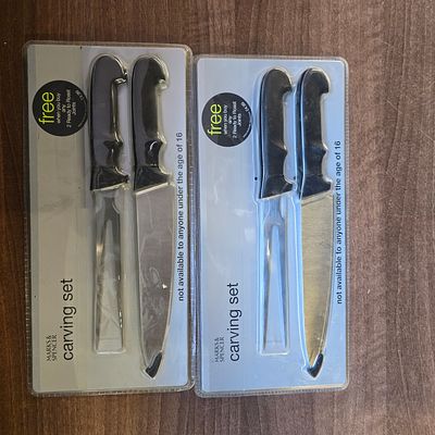 A Pair of Sealed MARKS & SPENCER Carving Sets. A Pair of sealed MARKS &amp; SPENCER carving sets 