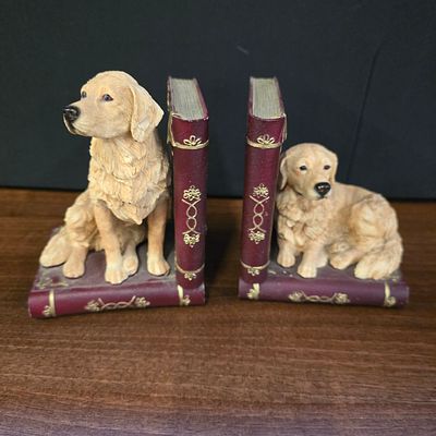 A Pair of Barnes and Noble Golden Retriever Puppy Bookends. A pair of decorative bookends 
