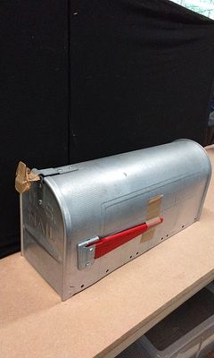 Steel City Corp Galvanized Steel Rural Mailbox with Red Flag. A silver galvanized steel rural 