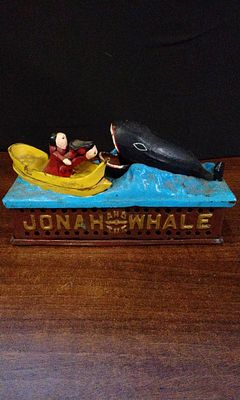 Cast Iron Mechanical Bank depicting Jonah and the Whale. A cast iron mechanical bank depicting 