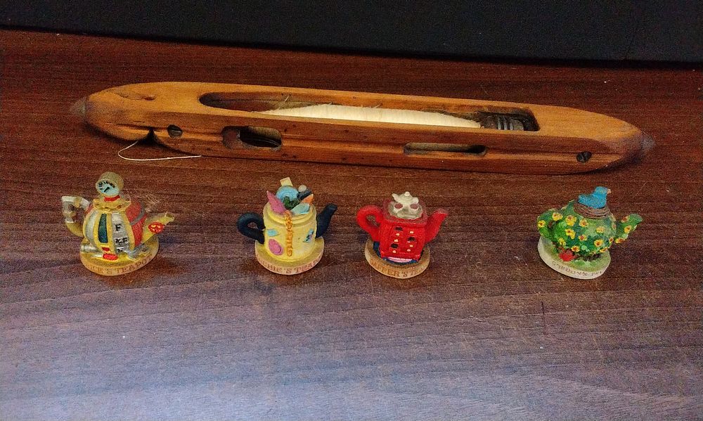 Lot 503: A Collection of Whimsical Miniature Teapot Figurines. And A Vintage Weaveing Shuttle
