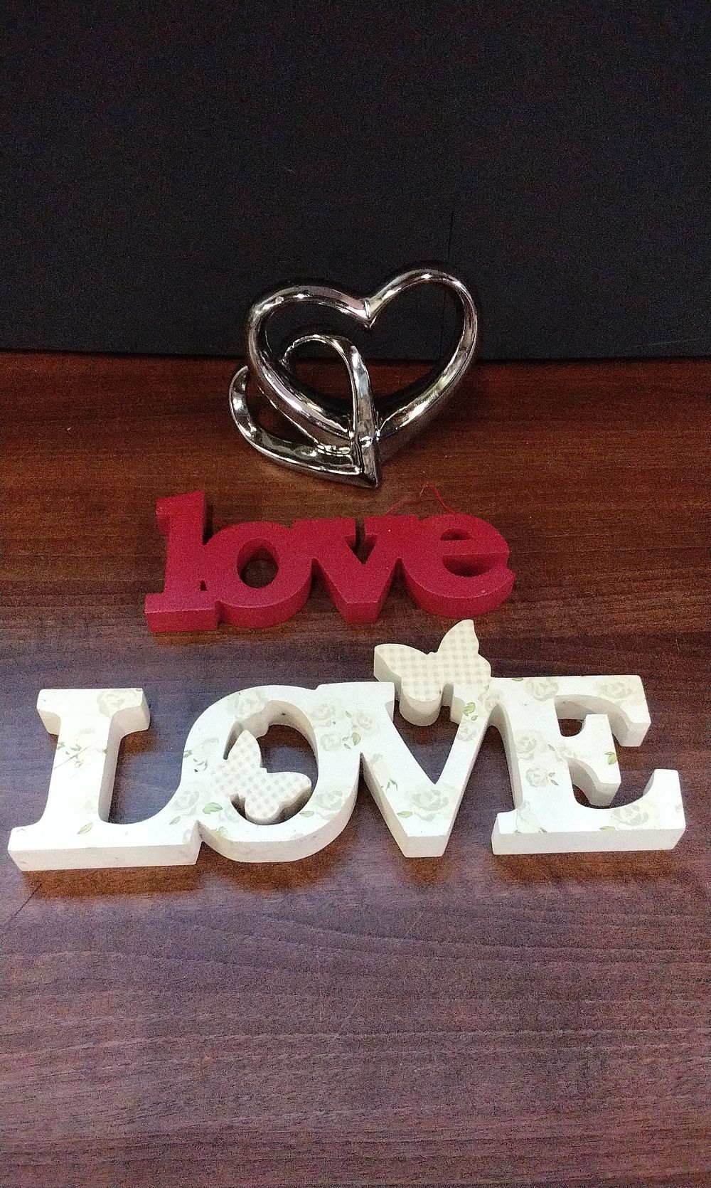 Lot 506: Three Decorative Love-Themed Sculptures and Signs