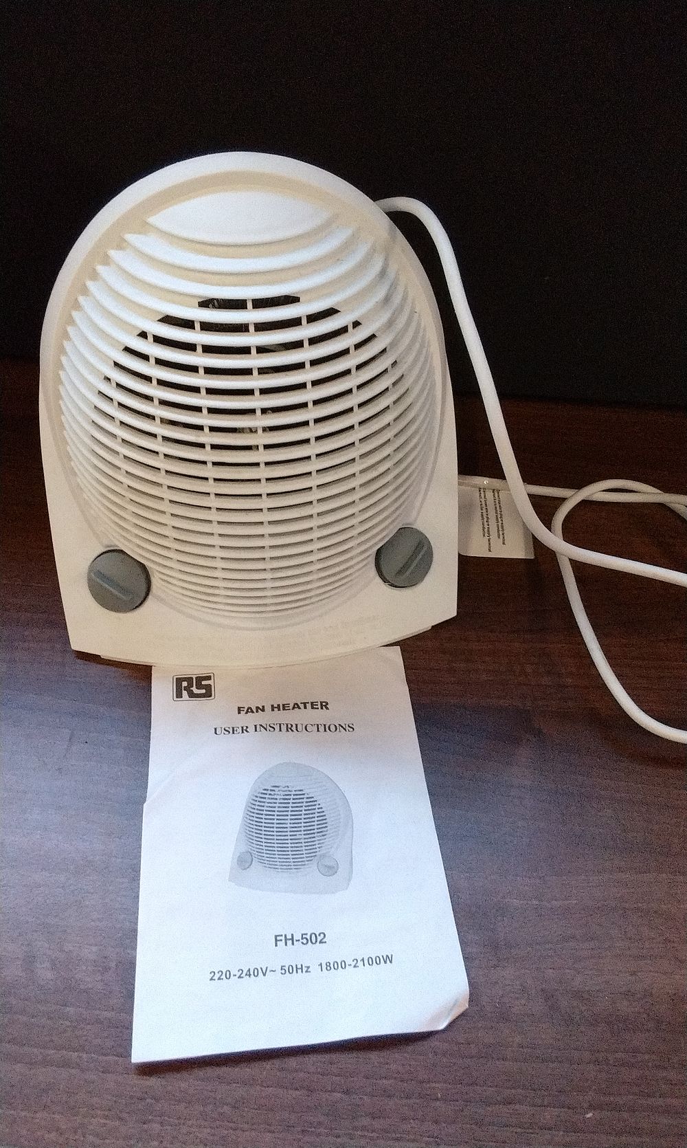 Lot 556: RS PRO FH-502 White Fan Heater and User Manual. Tested for Power