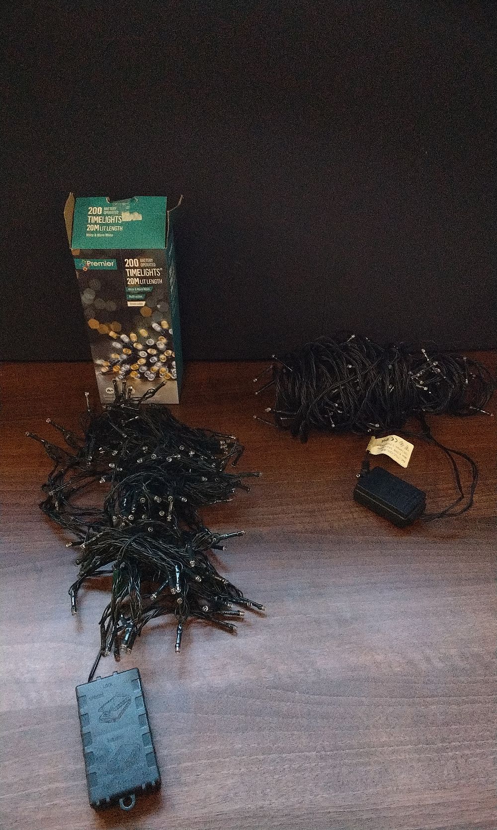 Lot 557: Premier 200 LED Battery Operated Timelights String Lights  and One set of Mains Powered Lights. Both Sets are A/F