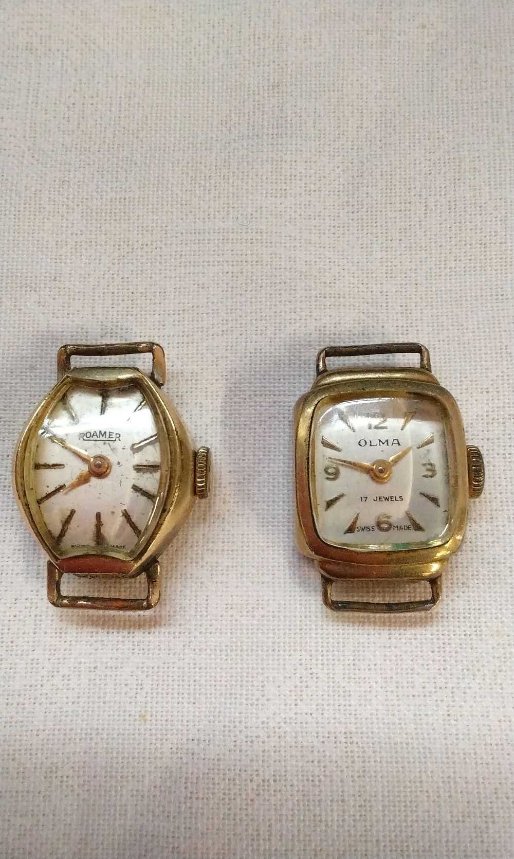 Lot 575: A Pair of Gold Plated Roamer and Olma Ladies Watch Heads