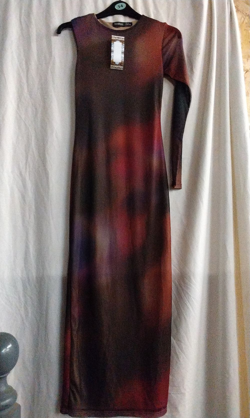 Lot 582: A Collection of 18 boohoo Abstract Mesh Long Sleeve Maxi Dresses