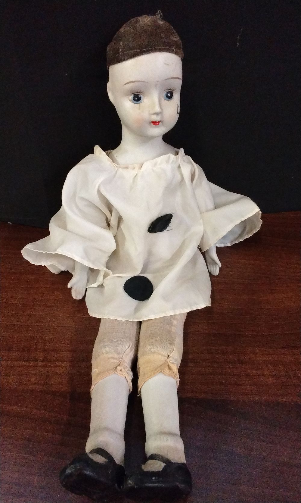 Lot 586: Antique Porcelain Pierrot Figural Doll