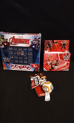 A Trio of Packaged Marvel, WWE, and Star Wars Toys. A Collection of 3 packaged toys including a 