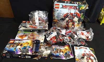A Collection of Four Partial LEGO Sets Including Ninjago Fire Mech. A Collection of 4 partial 