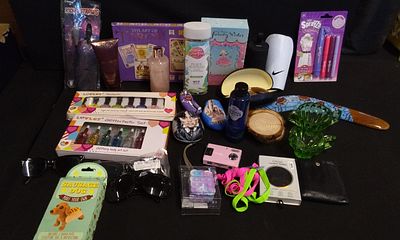 A Collection of Assorted Items Including Tarot, Cosmetics, and Toys. A collection of assorted 