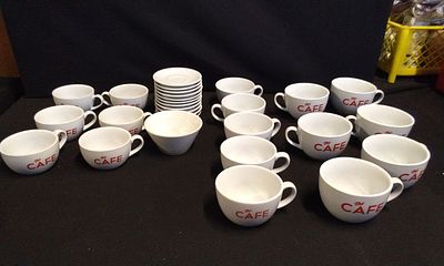 A Collection of 24 various Sizes White Ceramic Cafe Cups and Saucers. COLLECTION ONLY. A 