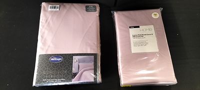 A Pair of King Size Pink Duvet Cover and Pillowcase Sets. A Pair of packaged King-size bedding 
