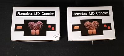 Two Boxes of 12 PK Green Flameless LED Candles in White and Warm White. 2 x 12 white cylindrical 