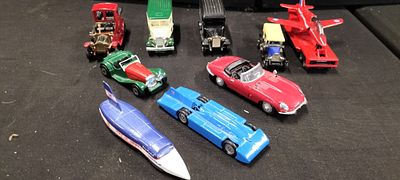 A Collection of 9 Die-Cast Matchbox and Speed Record Models. A Collection of 9 die-cast vehicles 