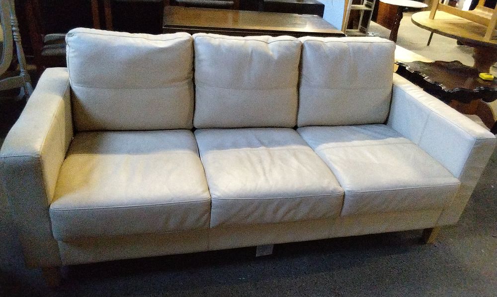 Lot 641: Cream Leather Three Seater Sofa VGC