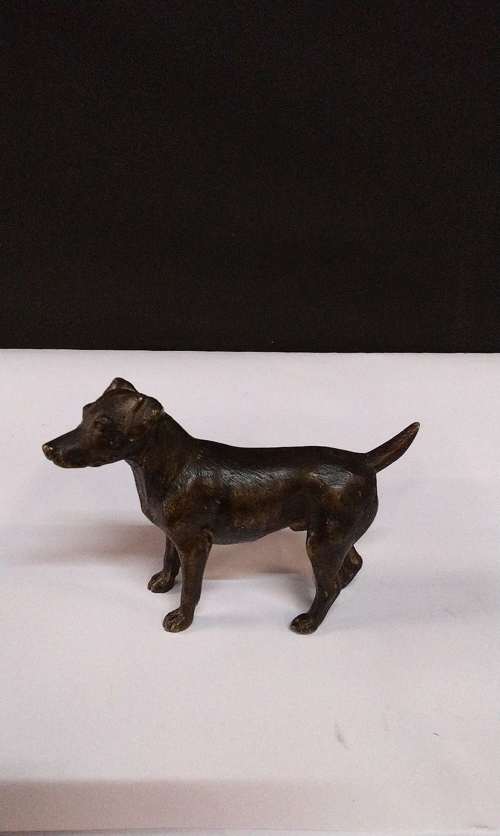 Lot 163: Small Brass sculpture of a Jack Russell dog.