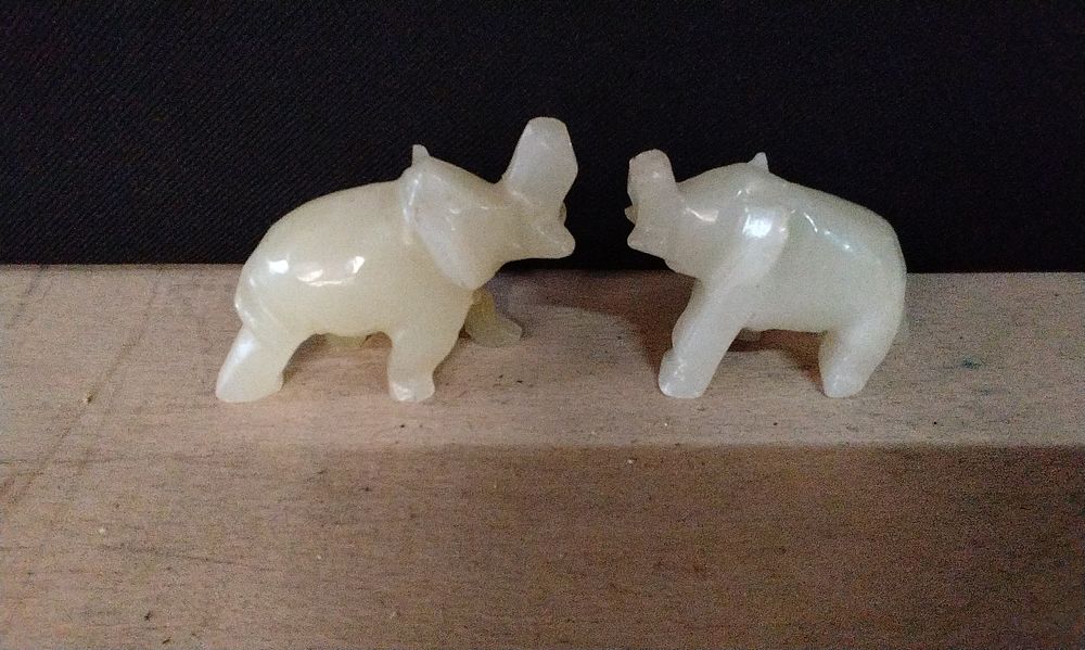Lot 165: Two Small Onyx Elephants. A/F