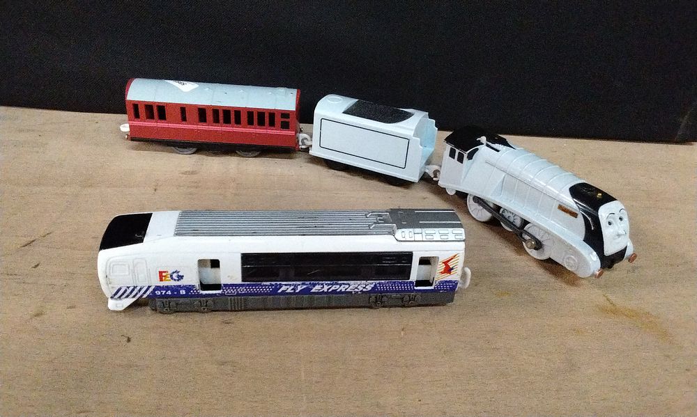Lot 169: Two Model Trains, Tomy. Thomas The Tank Engine TrackMaster Motorized Spencer toy engine. and a Fly Express High-Speed Rail, Compact Educational Subway Train