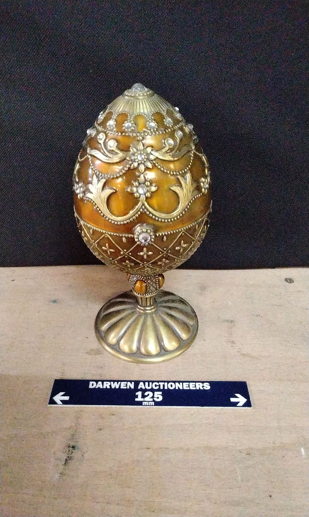 Lot 179: Metal Enamelled Musical Egg with Crystals and a Rotating Elephat Photograph Frame
