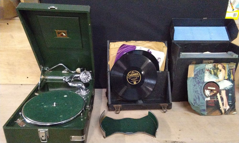 Lot 184: HMV Table Top Gramophone in a Green Finish Case with Handle. And Two Vintage Boxes of 78' Records