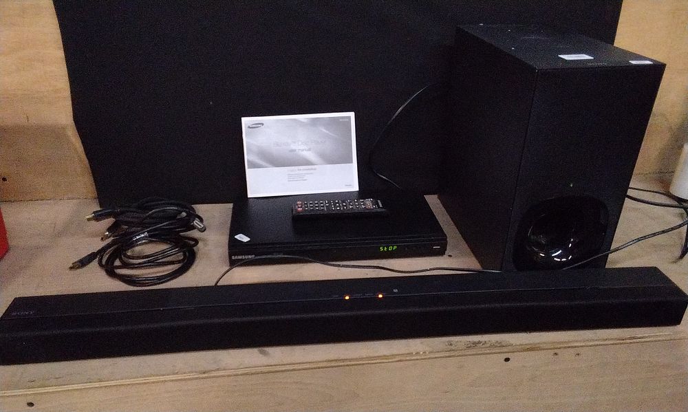 Lot 194: SonyActive Speaker System, Samsung Blue Ray with Remote Control, and a Sony Active Subwoofer. Tested for Power. COLLECTION ONLY
