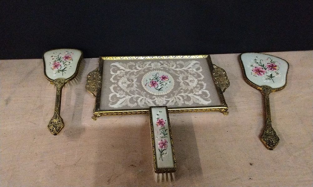Lot 206: Vintage Brass 4 Piece Vanity/ Dressing Table Set, Featuring Floral Embroidered Panels.