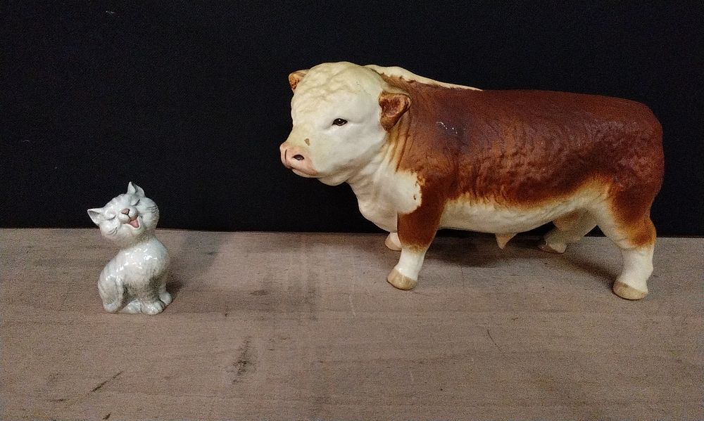 Lot 273: Two Porcelain Animal Figures. Beswick Fun Models Laughing Cat Figurine 2101, and a Hereford Bull