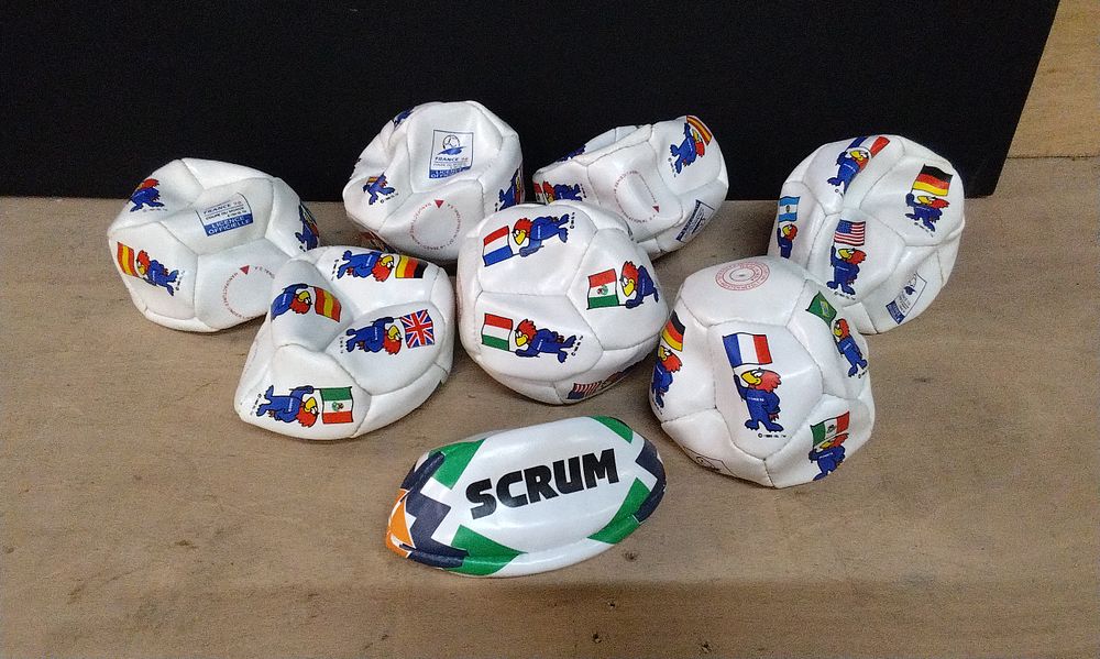 Lot 280: 7x France 98 Mini Footballs and 1x Scrum Mini Rugby Ball