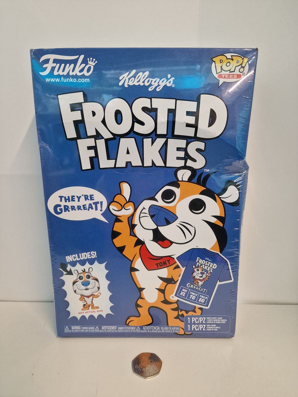 Lot 177: Funko Kelloggs Frosted Flakes Tony Tiger Figure and XL T-shirt