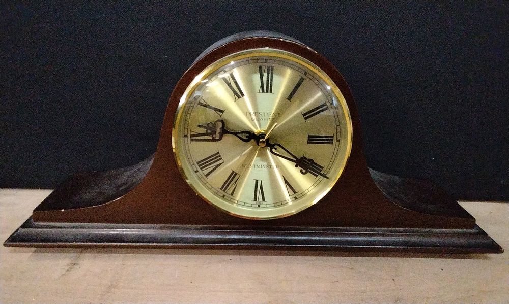 Lot 313: President Quartz Battery Operated Mantle Clock in a Wooden Case