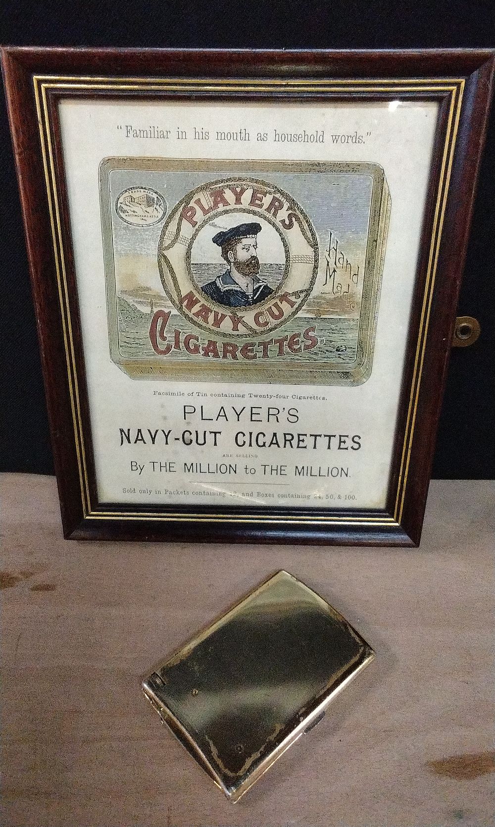 Lot 238: Vintage Player'sNavy Cut Tobacco Advertising Board and a Vintage Cigarette Case with Built in Lighter