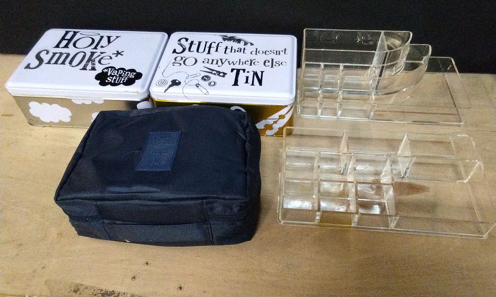 Lot 363: Selection of Various Storage Tins Two Clear Acrylic Storage Trays and a Travel Bag