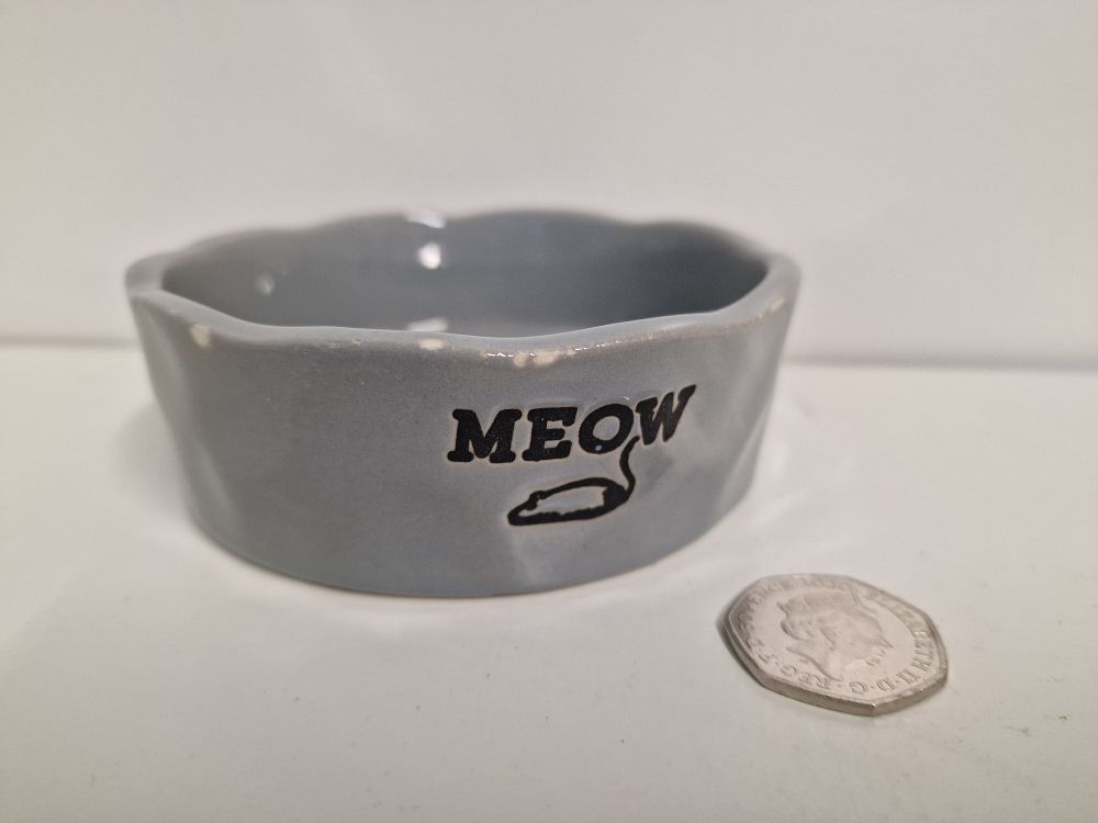 Lot 278: Cat Food Bowl