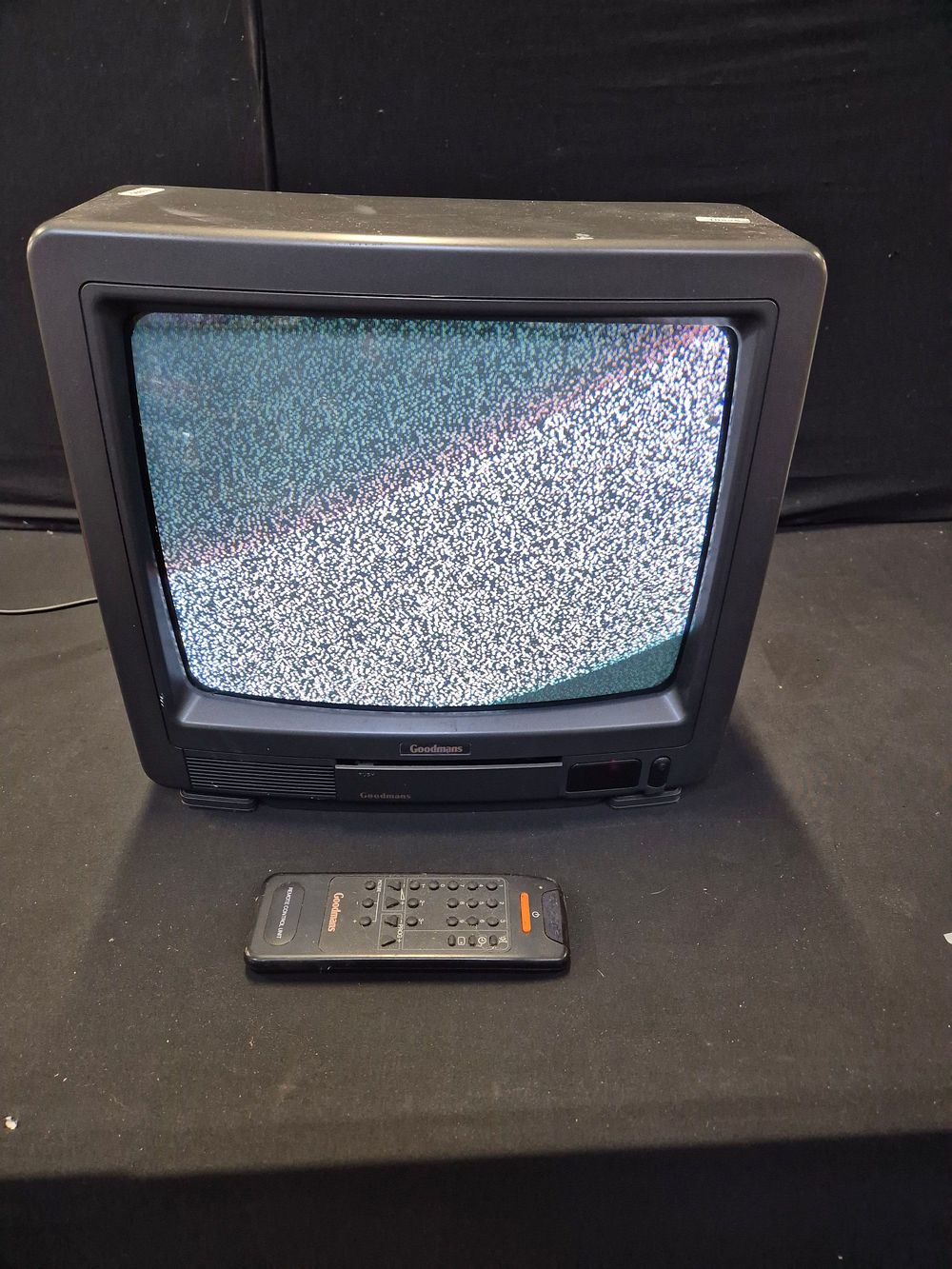 Lot 202: Goodmans Model 1404 CRT Television with Remote Control.