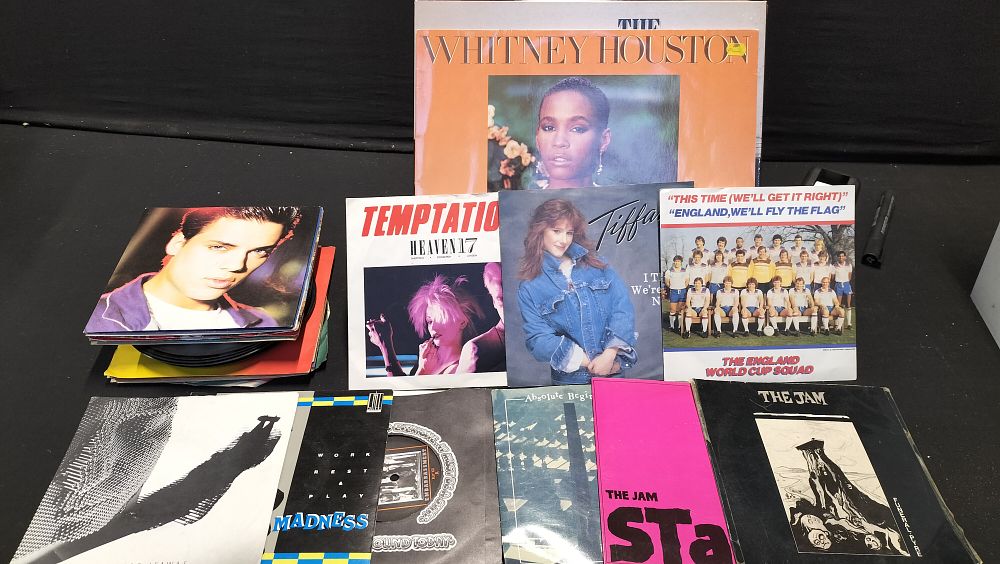 Lot 214: A Collection of 57 Vinyl albums and 35 7" Singles