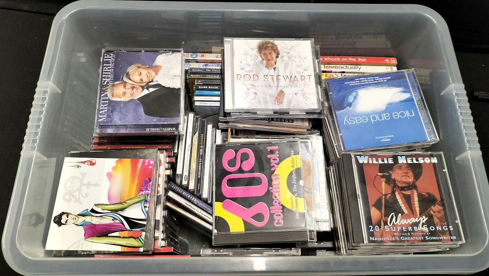 Lot 215: A Collection of CD's, DVD's and VHS tapes