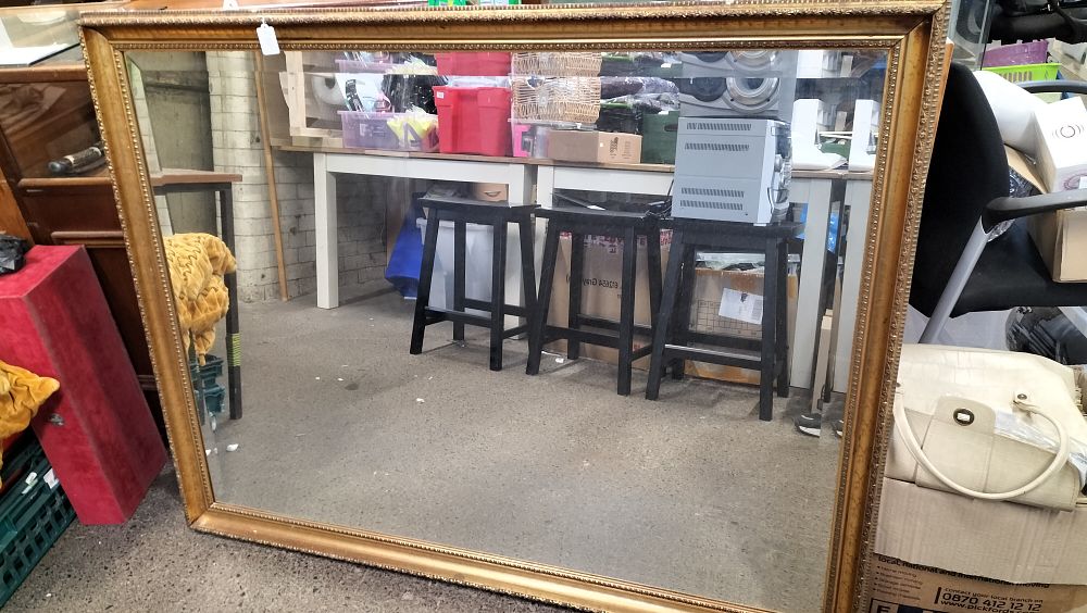 Lot 242: Large Ornate Gold Toned Bevelled Wall Mirror, Approx 133x102cm.