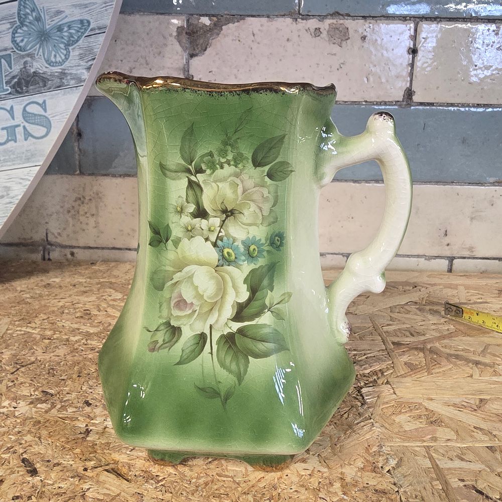 Lot 165: Rockingham Pottery Staffordshire jug