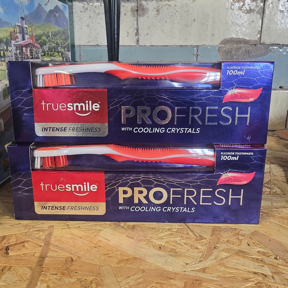 Lot 200: Two pro fresh true smile toothpaste and toothbrush