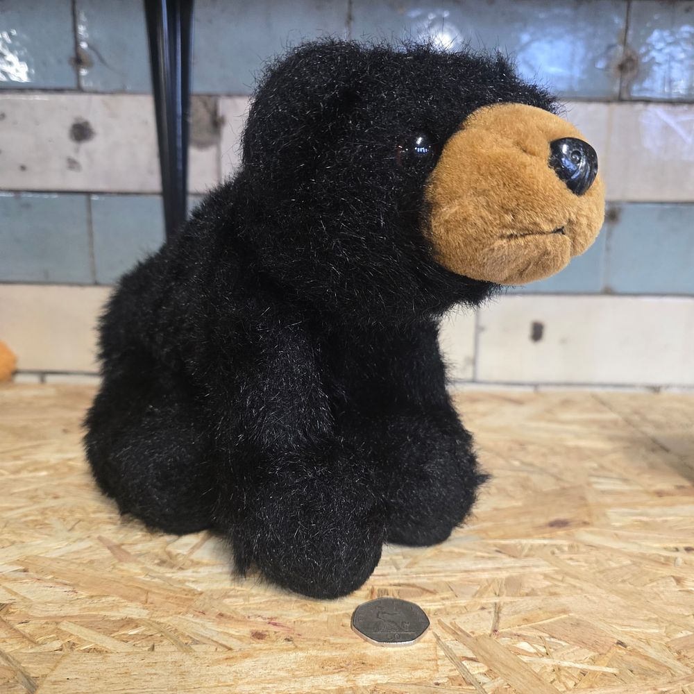 Lot 277: Vinatge black bear plush with bean feet