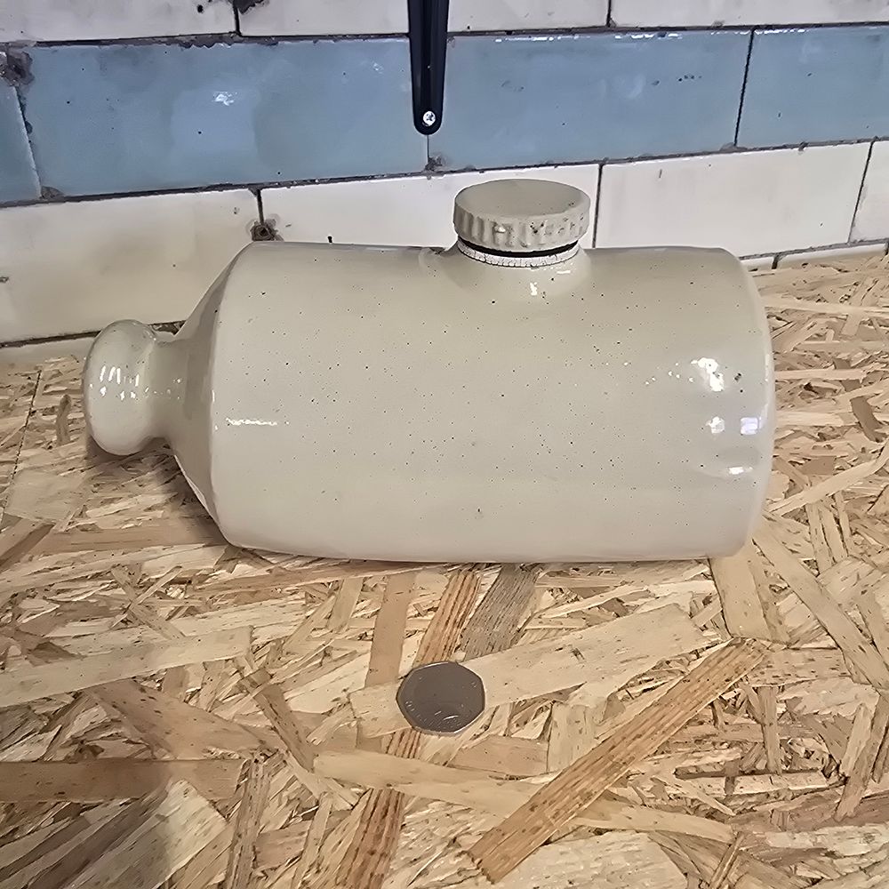 Lot 293: Vintage stoneware bed warmer